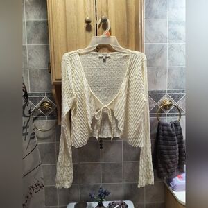 Boho look cream colored tie front coverlet